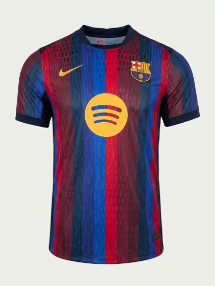 A short-sleeve FC Barcelona soccer jersey with vertical red and blue stripes, featuring a yellow Spotify logo on the chest, a yellow Nike swoosh, and the FC Barcelona crest on the left chest.